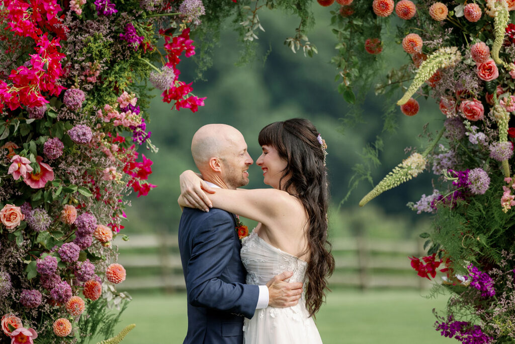 colorful pink and purple floral arch